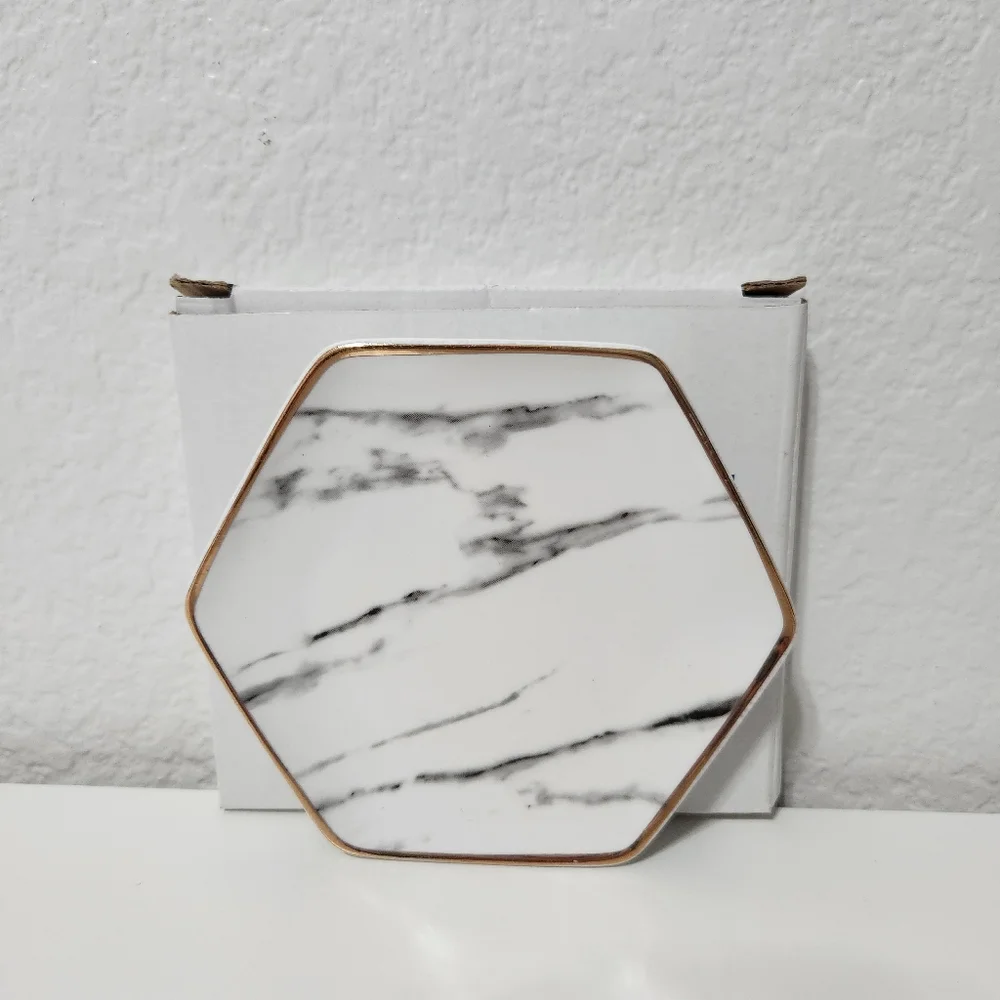 Pier one marble ring dish with gold trim